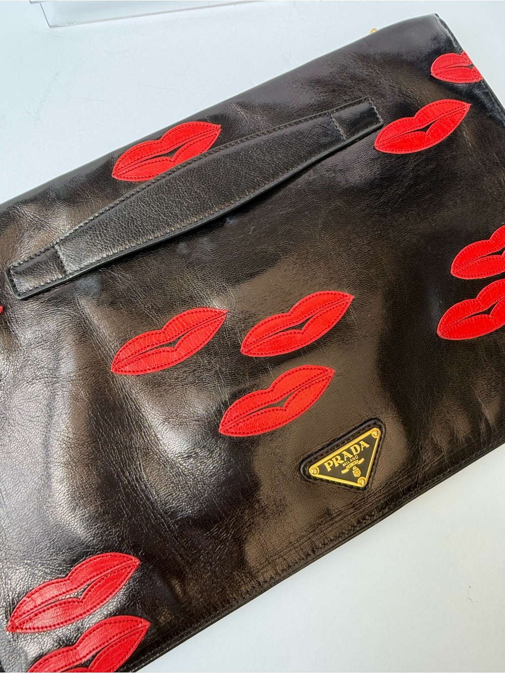 Prada Black Leather Clutch with Red Lip Appliqués